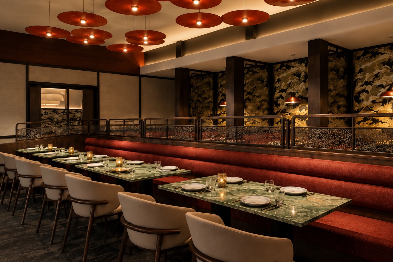 Fitout concept with red lantern-style pendant lights, red banquette seating and green marble dining tables