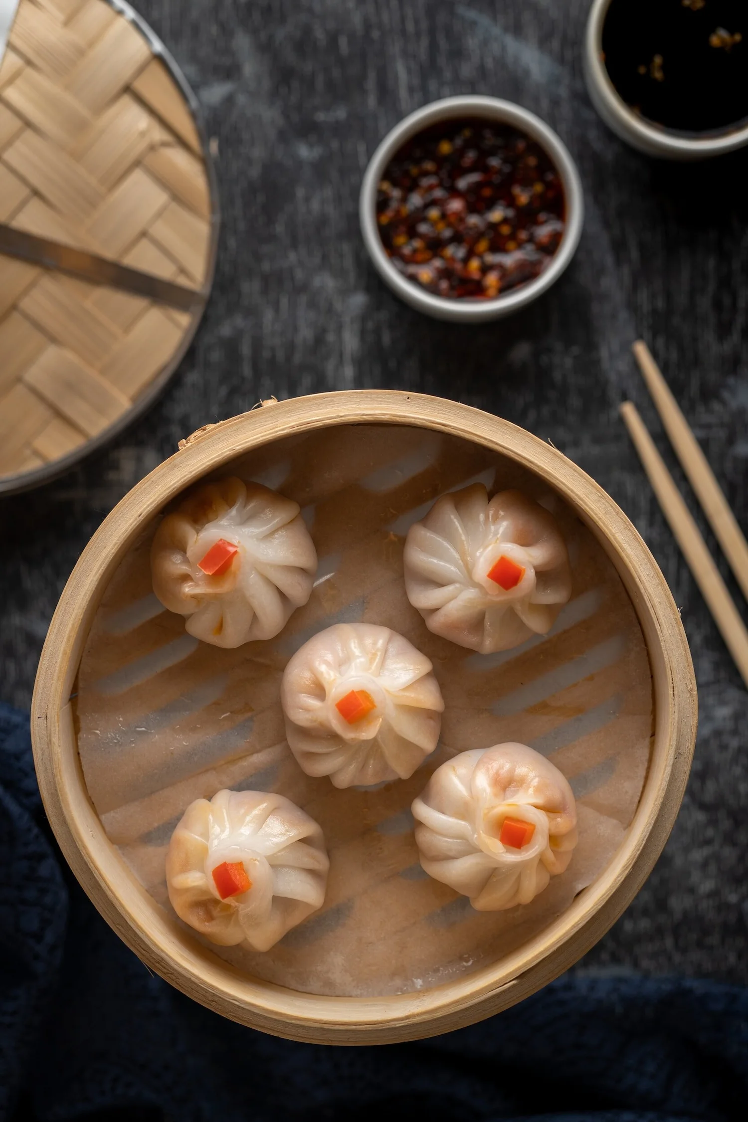 Steamed dumplings in a bamboo basket